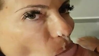 pretty housewife sucks and gets cum in her mouth