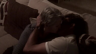 Mature wife kisses young neighbor