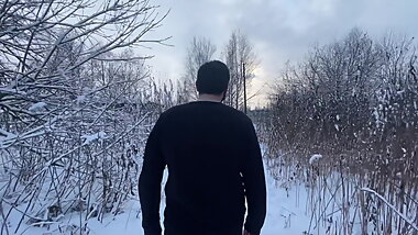 Redhead young girl whipped a guy in winter in the forest